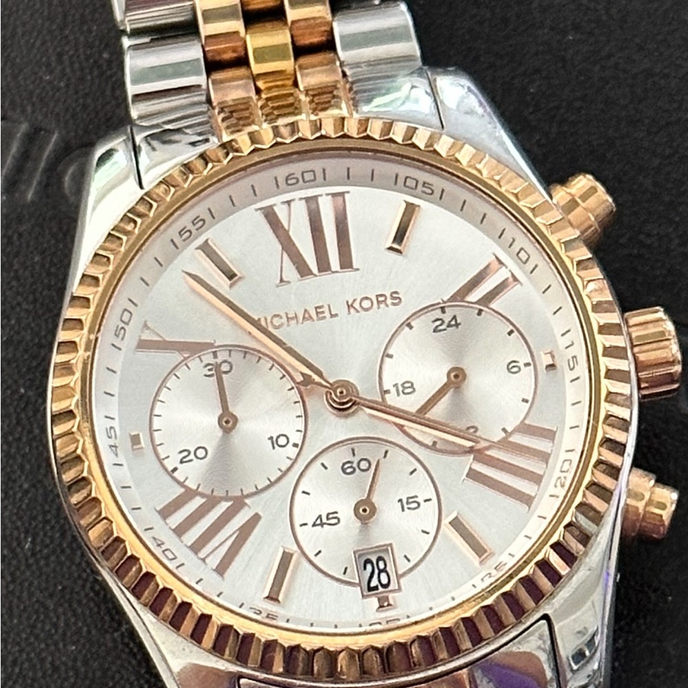 MICHAEL KORS silver tri-tone stainless steel Lexington Women’s wristwatch
